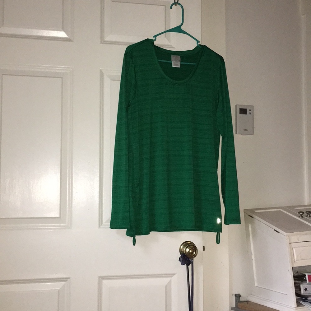 A green athletic long sleeve shirt